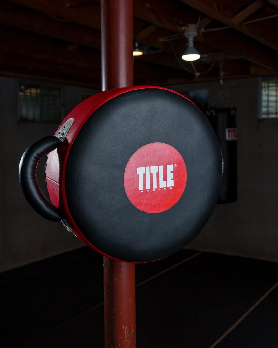 Маківара кругла TITLE Boxing Wrap-Around Stationary Punch Shield Black/Red