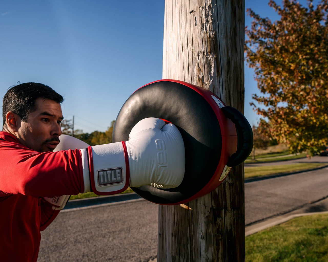 Маківара кругла TITLE Boxing Wrap-Around Stationary Punch Shield Black/Red
