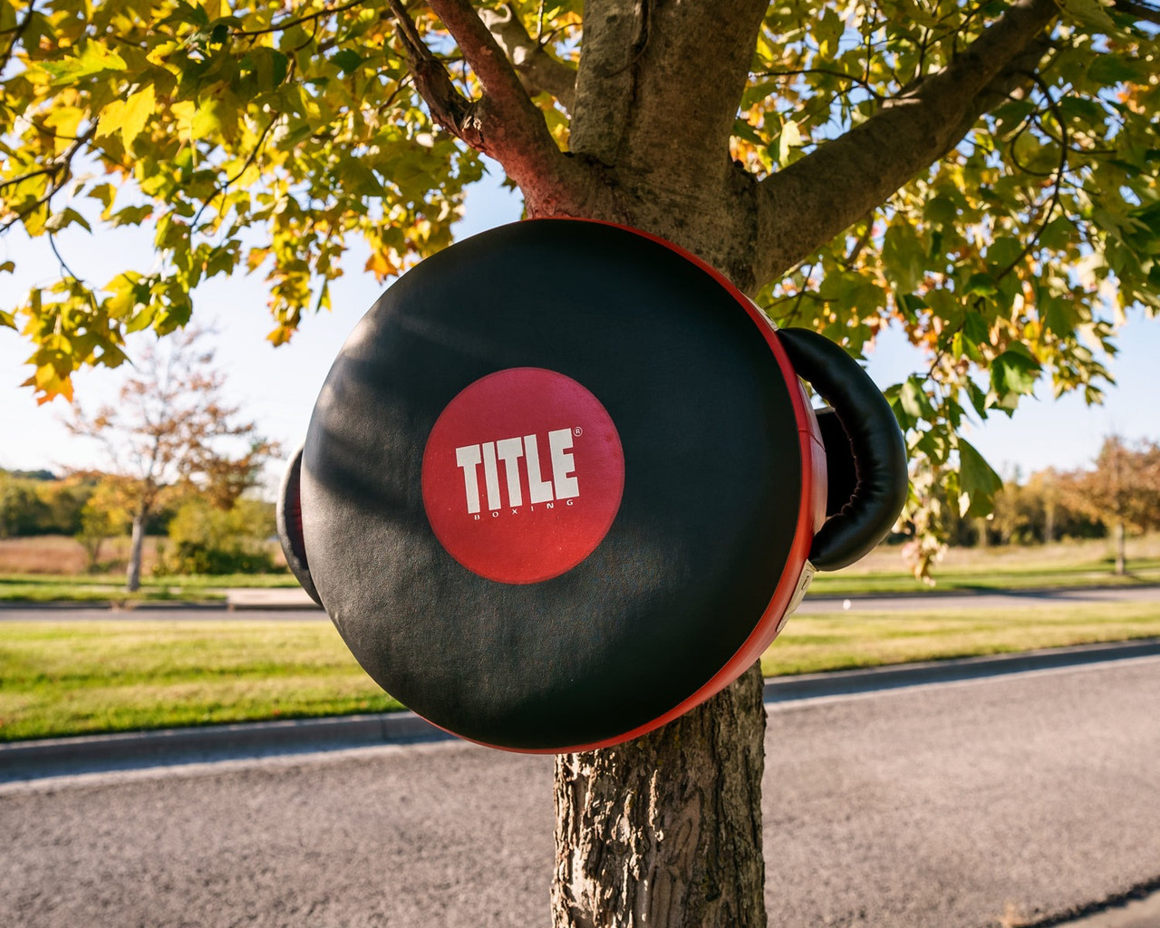 Маківара кругла TITLE Boxing Wrap-Around Stationary Punch Shield Black/Red